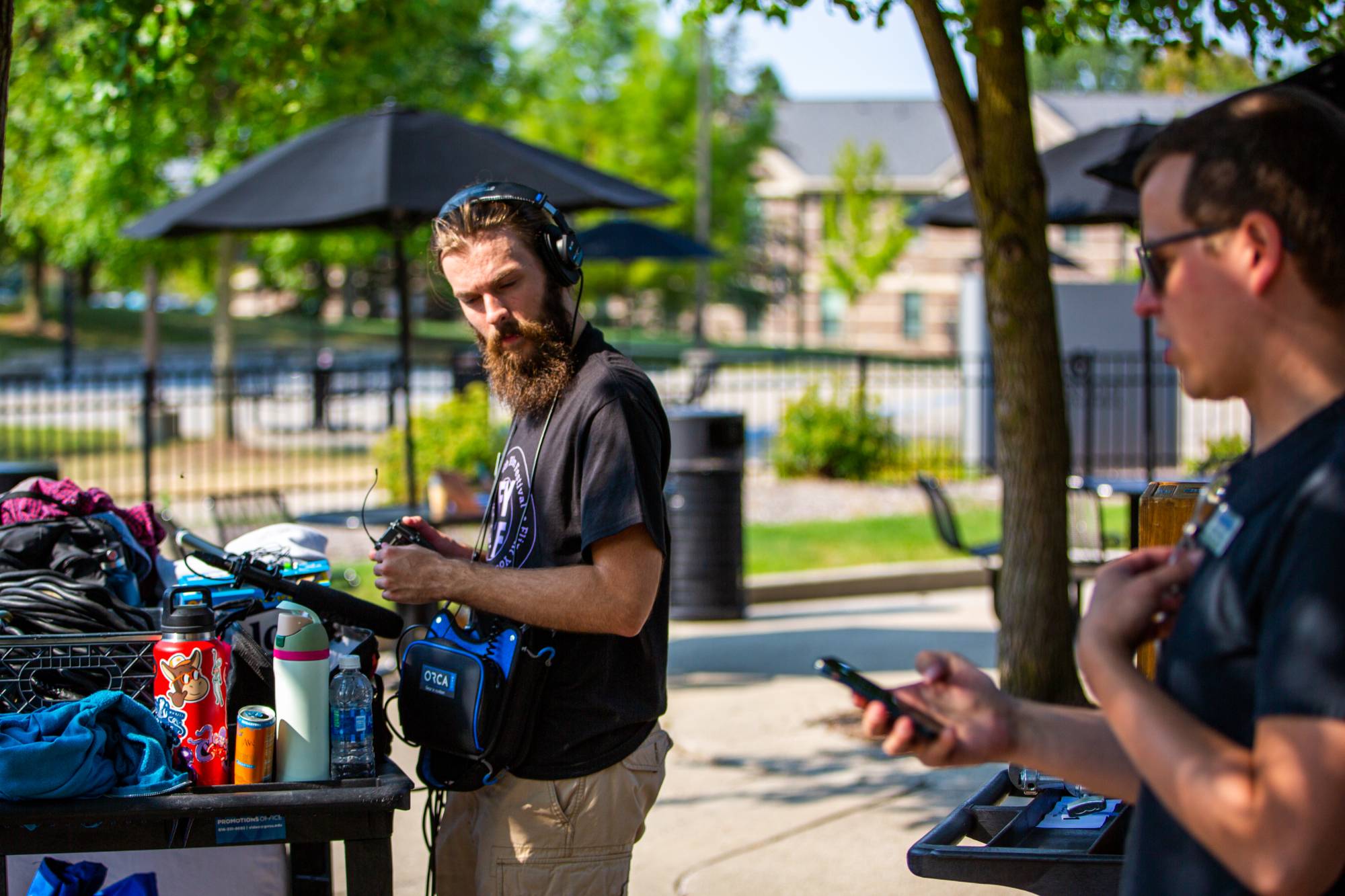 A student wearing headphones and listening intently